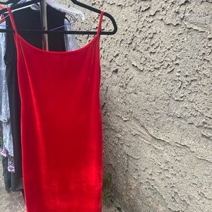 Red Velvet Reformation slip dress 
Low cut back